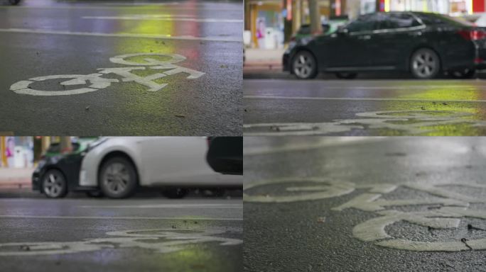 自行车道地面交通标志雨中霓虹汽车电动车轮