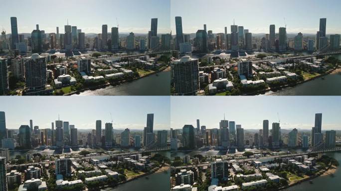 布里斯班故事桥和布里斯班河上的现代办公大楼的4K鸟瞰图实时镜头