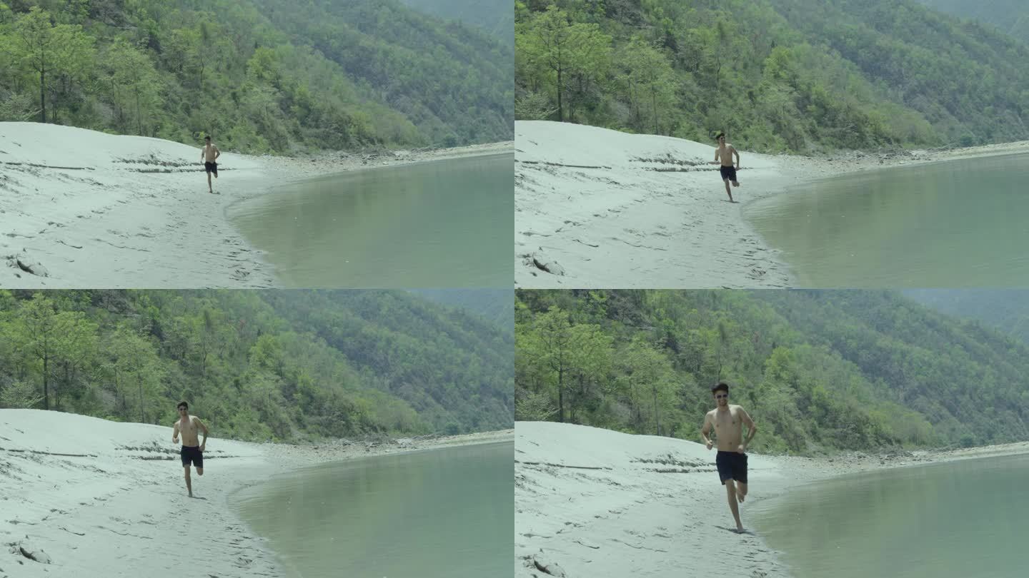 暑假期间，光膀子的年轻人在河边跑步