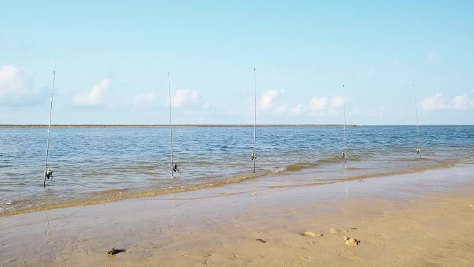 4K拍摄年轻人在海边垂钓