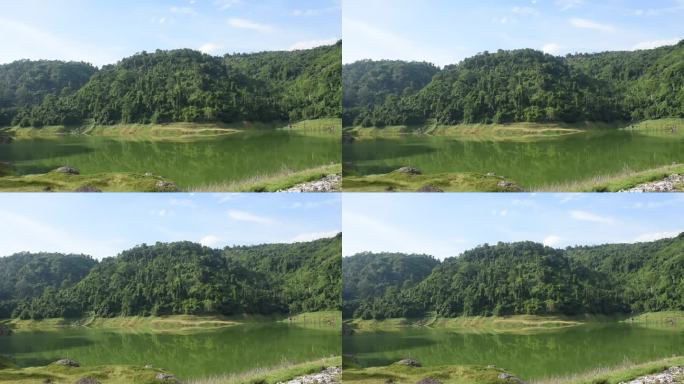 以山为背景的九龙巴生水库湖泊景观