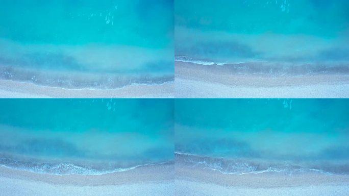 亚得里亚海的波浪拍打着小卵石海滩。