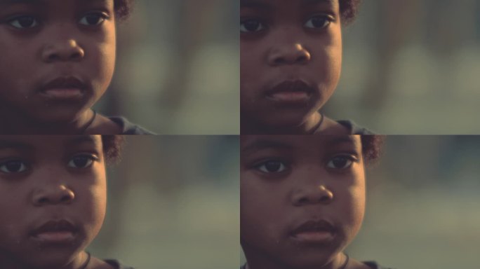天真的小男孩/脸外国人非洲孩子视频素材