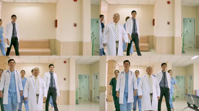 亚洲医生和资深医生一起在医院散步。