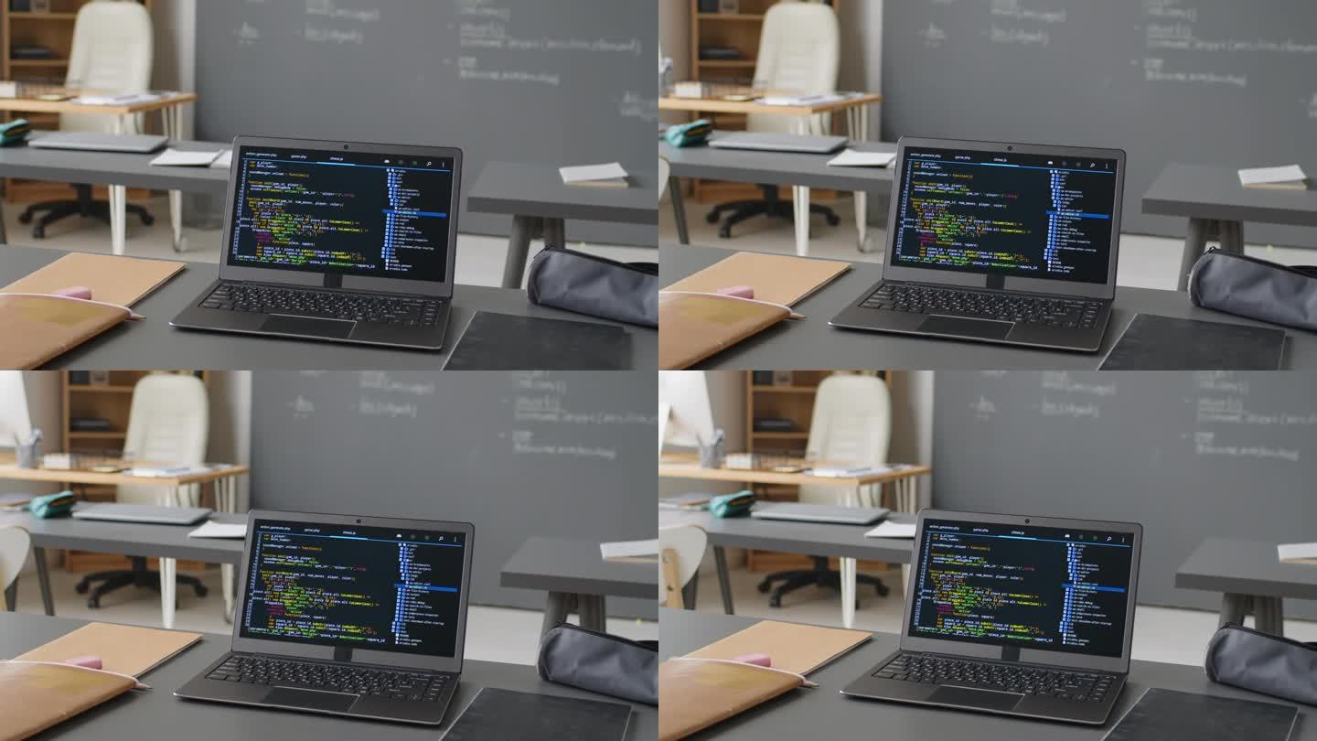 学校教室里屏幕上有代码的笔记本电脑