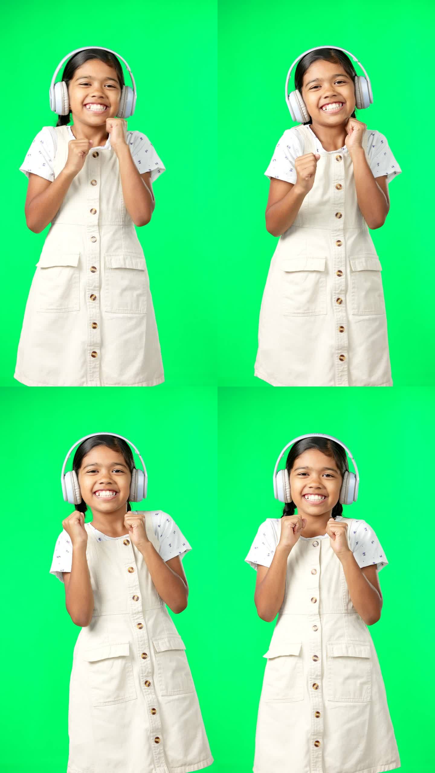 孩子们，音乐和舞蹈与一个女孩在一个绿色的屏幕背景在演播室流式音频耳机。肖像，微笑和乐趣与一个可爱的小