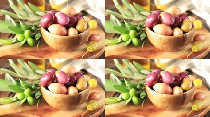 新鲜采摘的橄榄放在木碗里，榨油放在旧木板上。