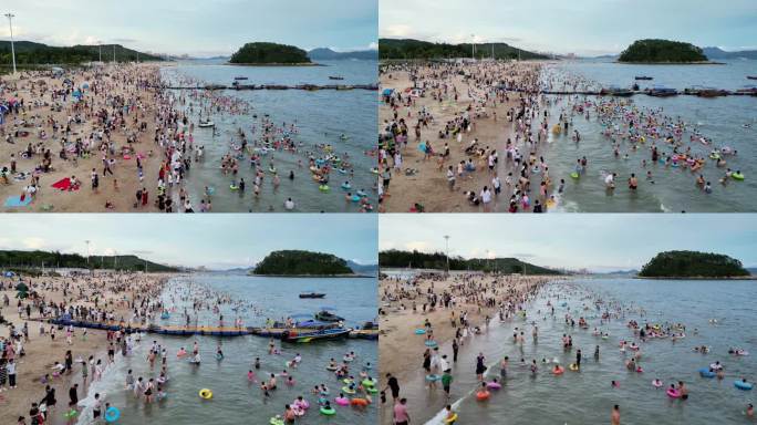 夏天海边人山人海的沙滩航拍4K视频