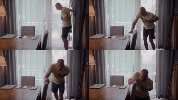 一段4k视频显示，一名男子在家走路时胸口疼痛