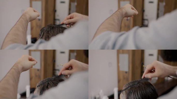理发师在美容院和男人一起工作时，用剪刀梳理和修剪白发的特写