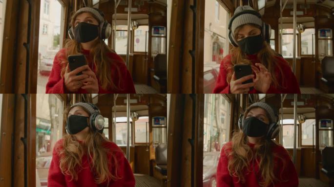 Young woman in face mask ride in tram or bus