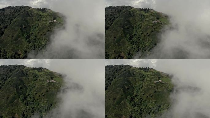 无人机在云中发现耕地山脉的航拍照片