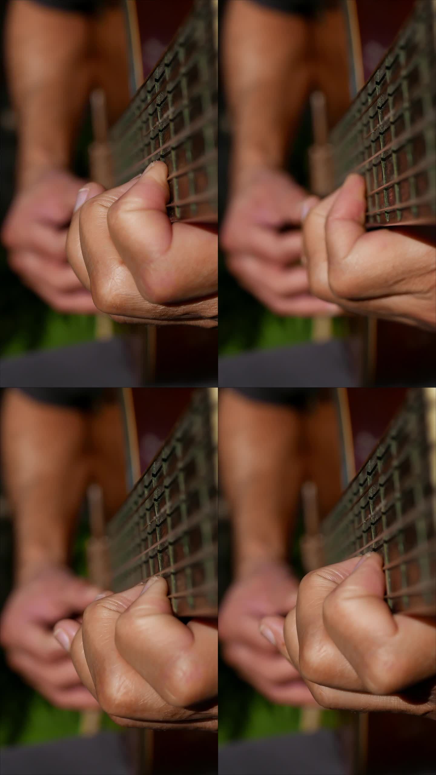 原声音乐。一个人在阳光下弹吉他。户外弹原声吉他的人。吉他指板的特写镜头。演奏乐器的音乐家。