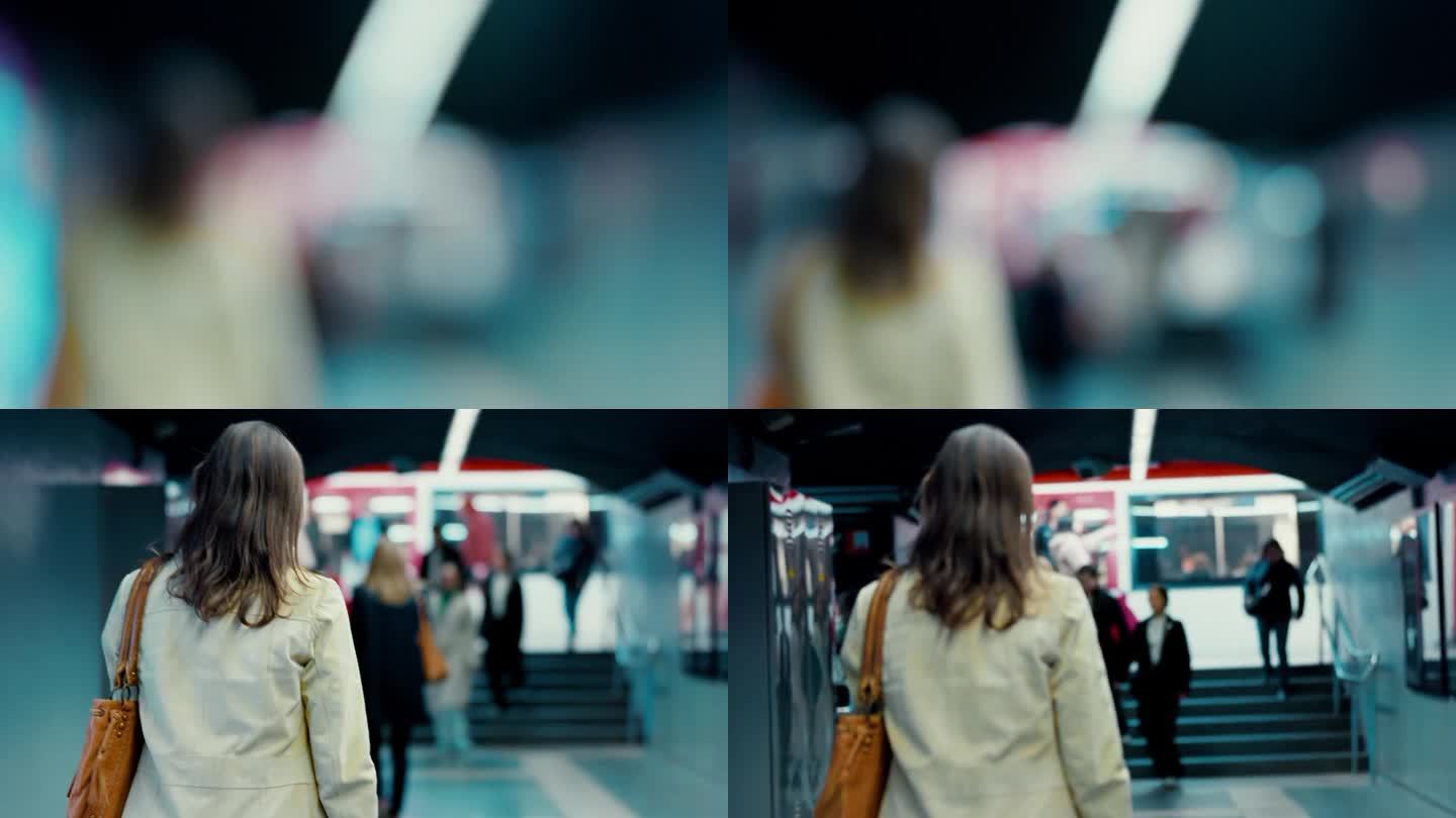 一名女子走向地铁站台