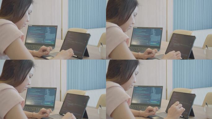 亚洲女性在家用笔记本电脑学习和练习python编程。教育与技术。