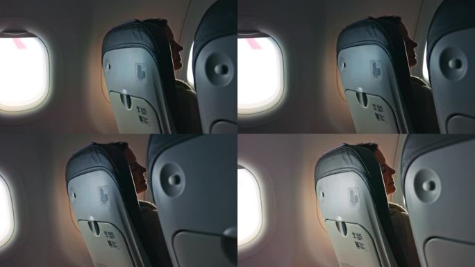 女乘客舒适地坐在飞机内部