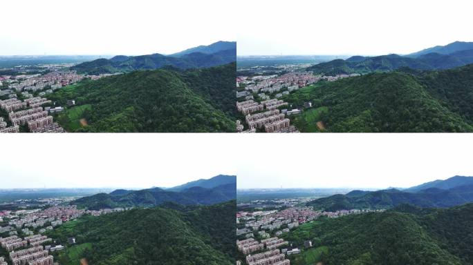 航拍杭州西湖群山与居民区