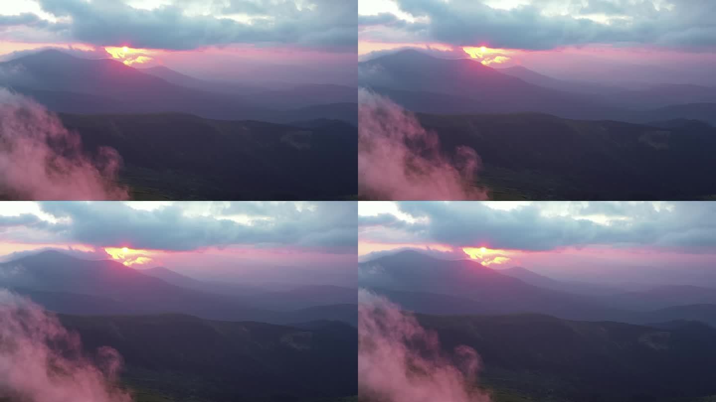 云与日落天空背景在山，背景暗红紫色日落