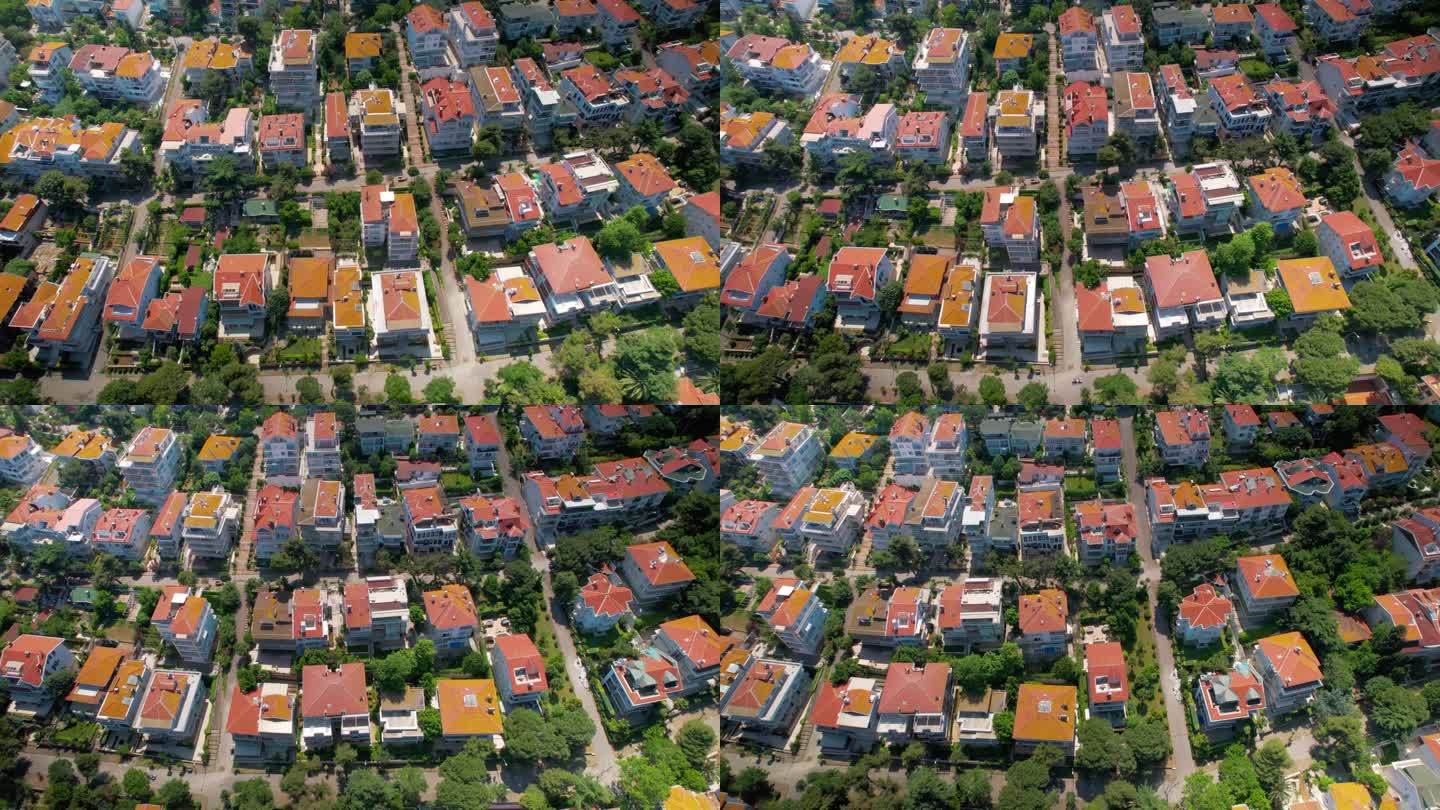 土耳其Kinaliada的空中无人机视图。多个住宅建筑位于马尔马拉海边，绿意盎然
