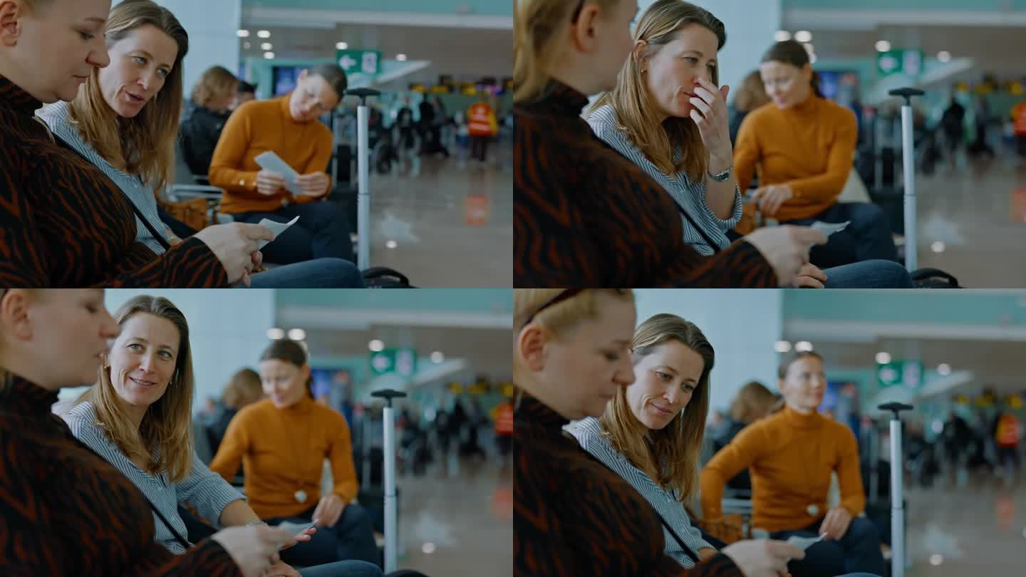 MS三个女性朋友在机场核对机票