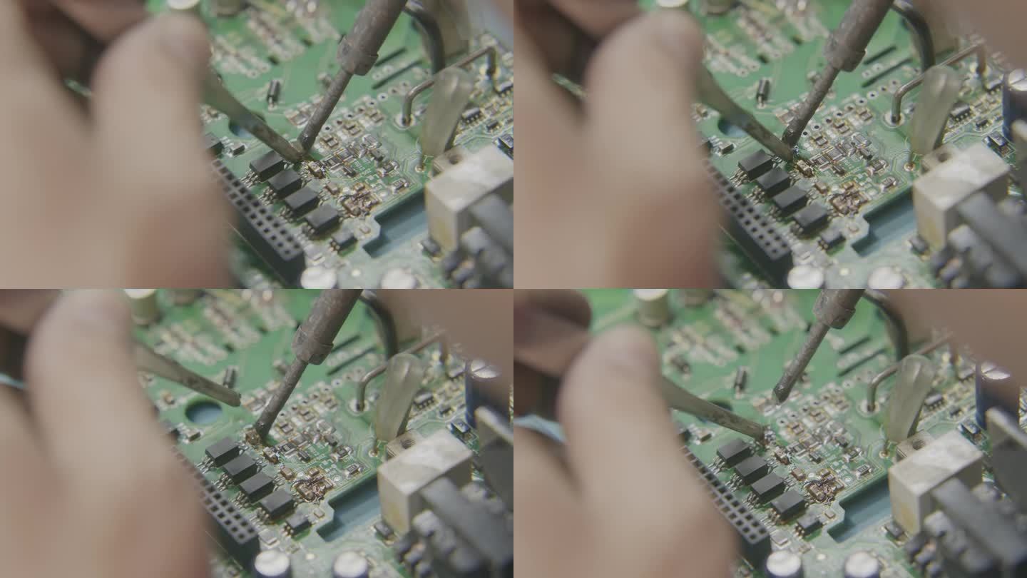 电烙铁师傅在电脑板上焊接电子元件