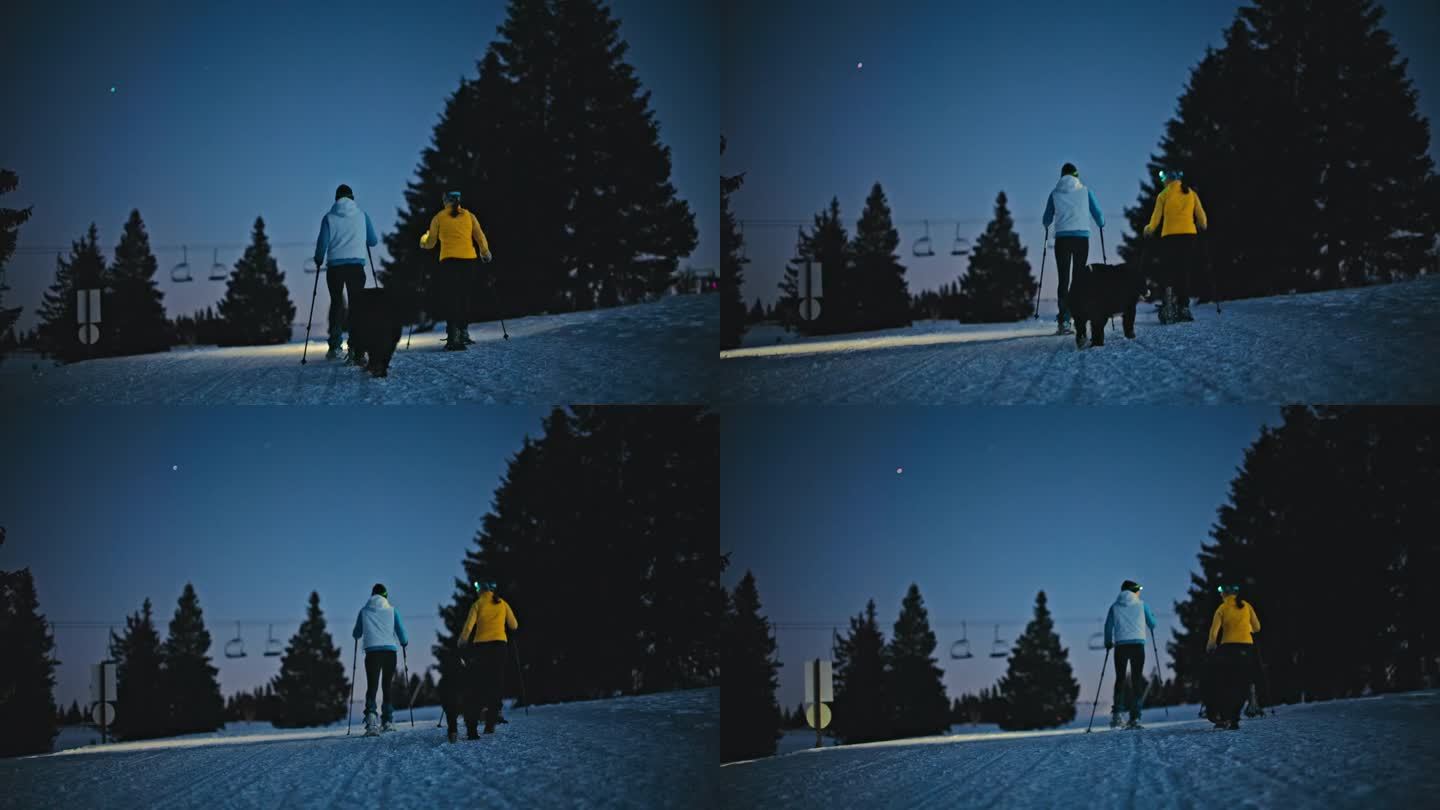 黄昏时分，两个女人在滑雪胜地走雪鞋