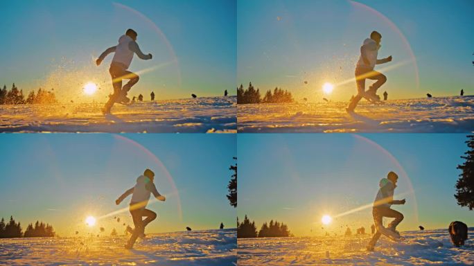 一个女人穿着雪鞋和她的狗在山上的雪地上奔跑