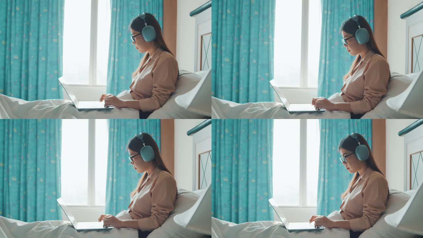 女人在床上听音乐女人在床上听音乐电脑