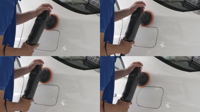 近距离拍摄一位使用电动汽车打蜡机给汽车打蜡的男子的手