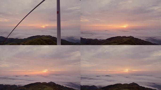 朝霞之下，云海之上：清晨的风力发电机