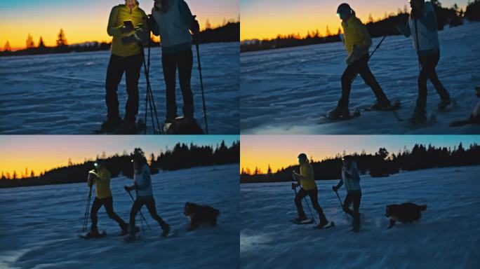 两名妇女在乡间雪地行走时，用智能手机查看方向