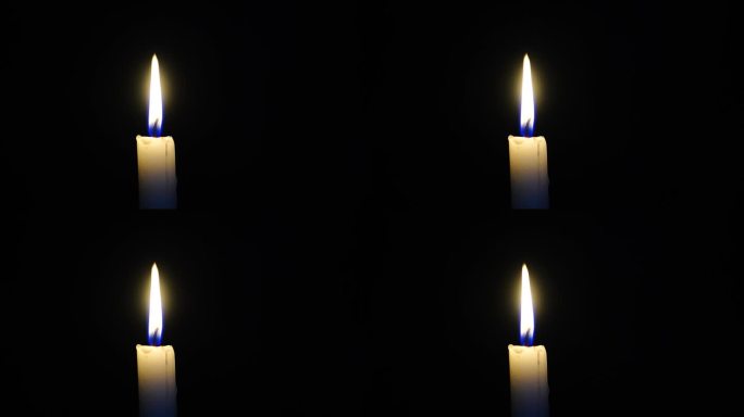 烛光下的特写镜头蜡烛烛火烛光里的妈妈祈愿