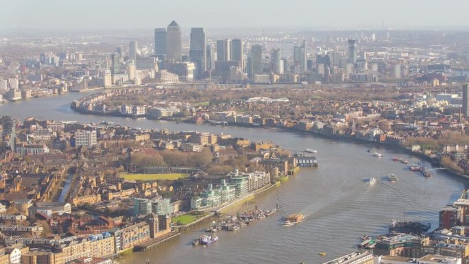 摩天大楼办公商业建筑区域金丝雀码头，伦敦，英国，延时平移，放大和从顶视图