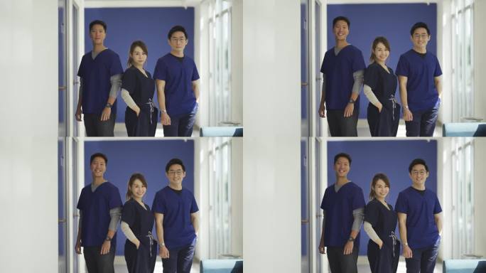 亚洲华人医生护士对着镜头微笑