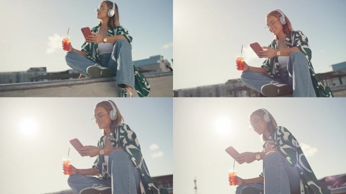 手机，耳机和屋顶上的女人，在城市景观中喝着酒跳舞，微笑着在社交媒体上放松。音乐，流媒体和z世代女孩在
