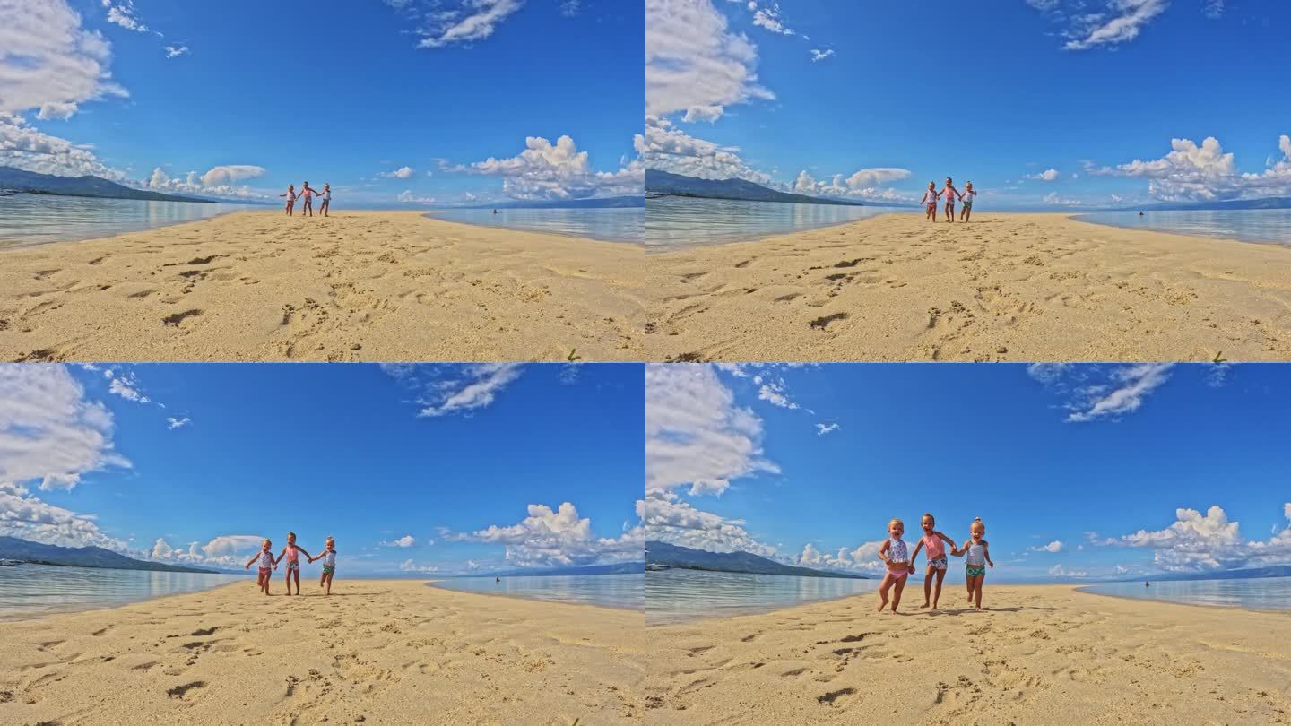 三姐妹的孩子们在海滩和浅水里玩耍