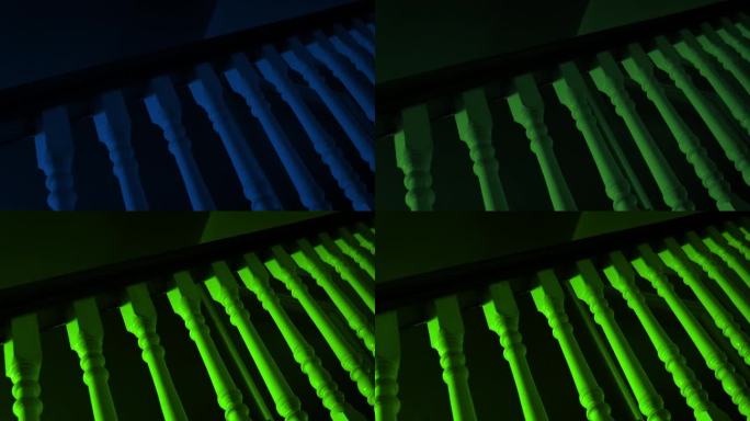 不明飞行物用绿光照亮了房子的楼梯
