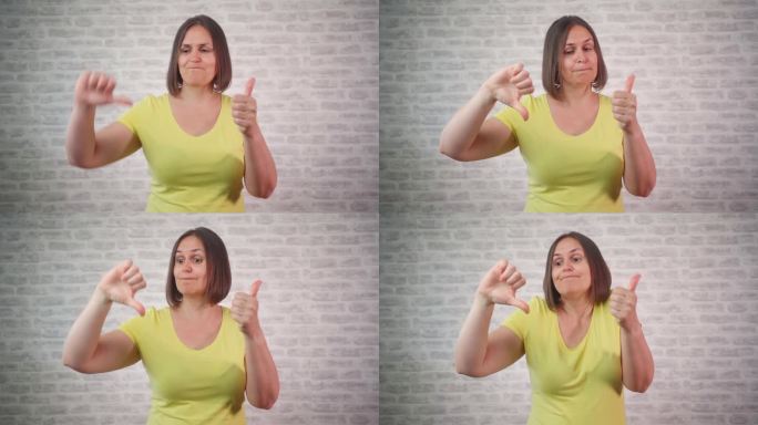 4k视频片段是不喜欢不喜欢女人拇指向下GIF循环。女人摇头否定地表示不同意，然后女人做出热情的喜悦表
