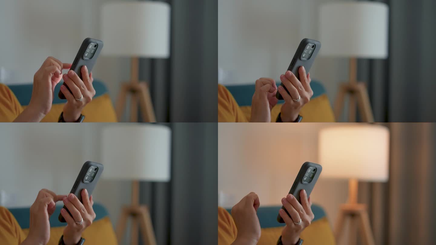 女性用智能手机开灯的特写镜头。