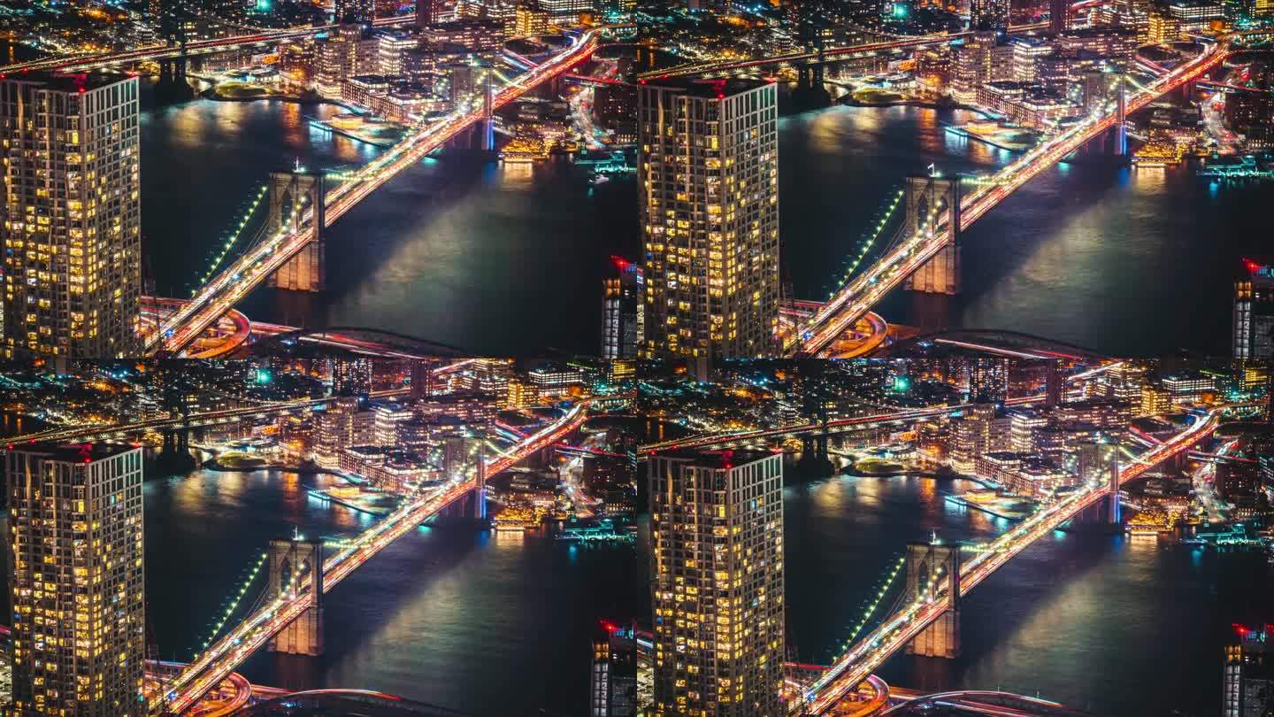 日落时分，美国纽约曼哈顿东河上的布鲁克林大桥和曼哈顿大桥的纽约市景河滨延时拍摄