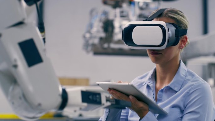 机械臂、vr眼镜与工程师用平板电脑、检测与技术开发用连接。女性，女性员工和虚拟现实眼镜，制造和机器人