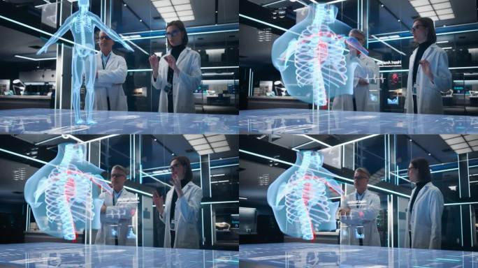 两名生物工程师在未来实验室中使用计算机驱动的人体胸部动画视觉特效全息图。白人男性和女性致力于创新心脏
