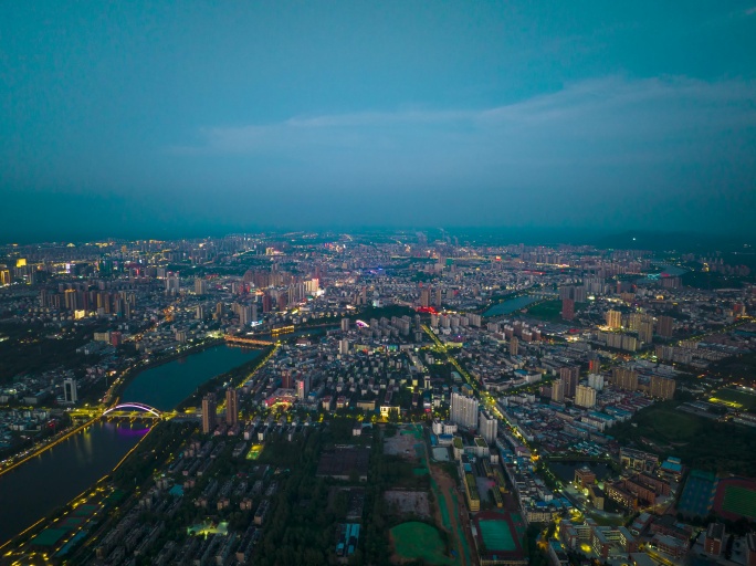 航拍信阳城市大景延时航拍信阳日转夜延时