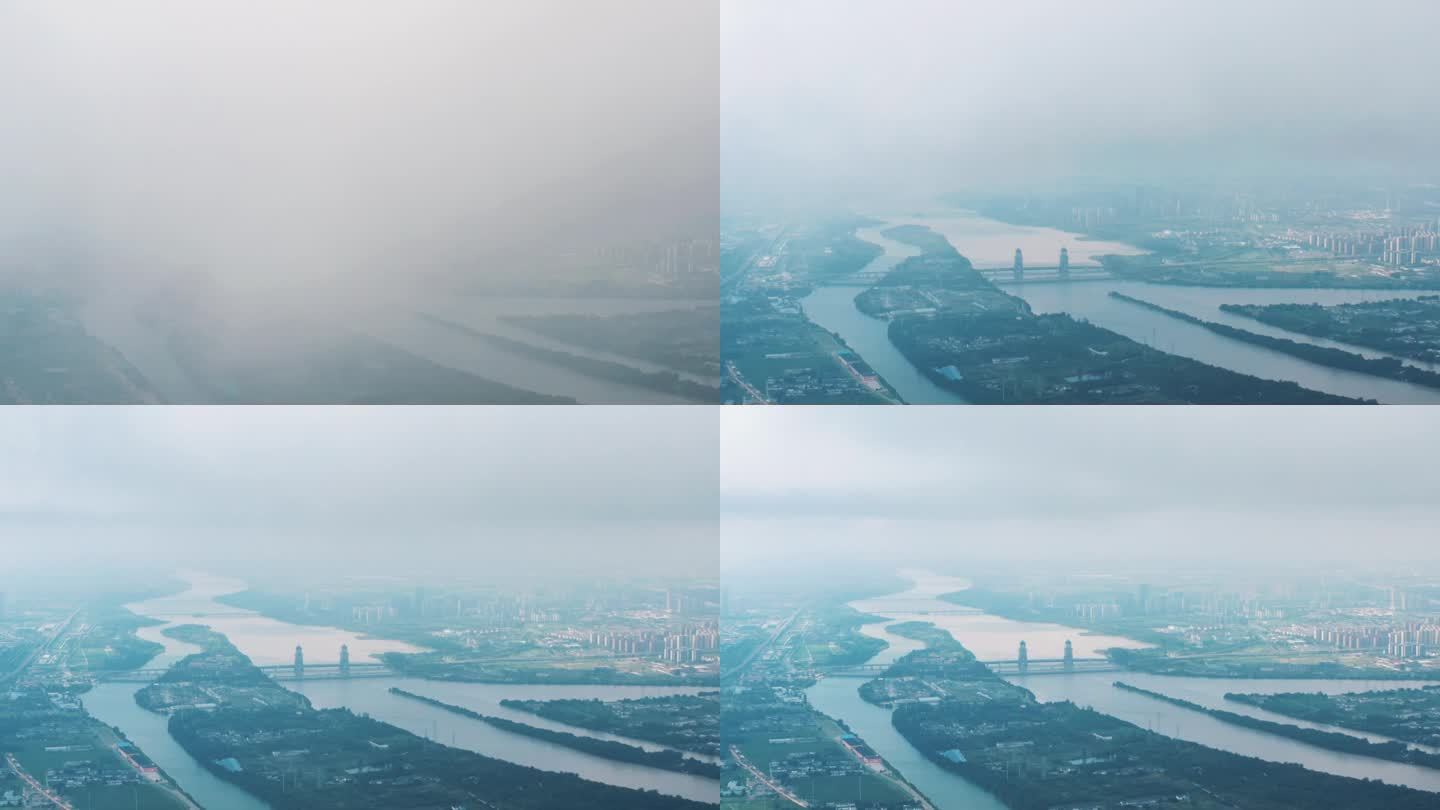 无人机从云中降落拍摄万福大桥