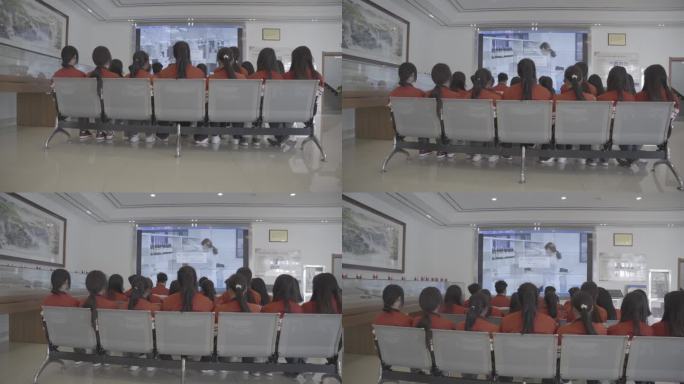 一群学生在屏幕前学习