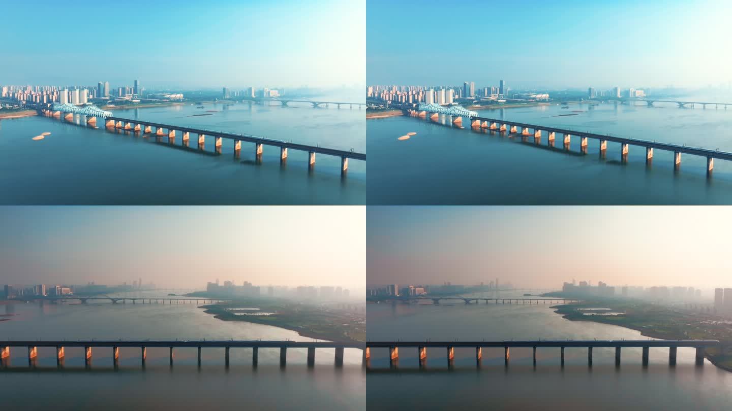高铁驶过城市跨江大桥