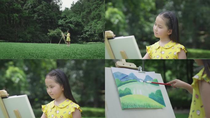 孩子在草地上画画