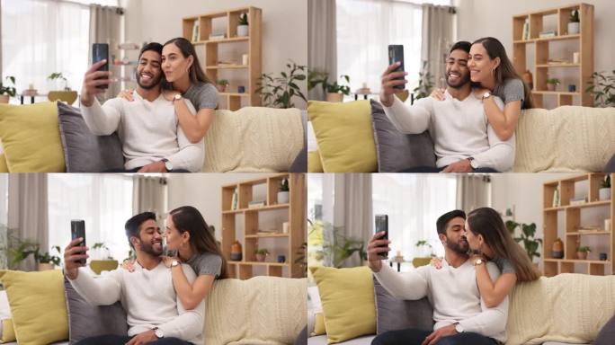 幸福的情侣，在沙发上自拍拥抱亲吻，拍个人头像、视频或回忆一起在家放松的时光。男人和女人在客厅亲吻、拥