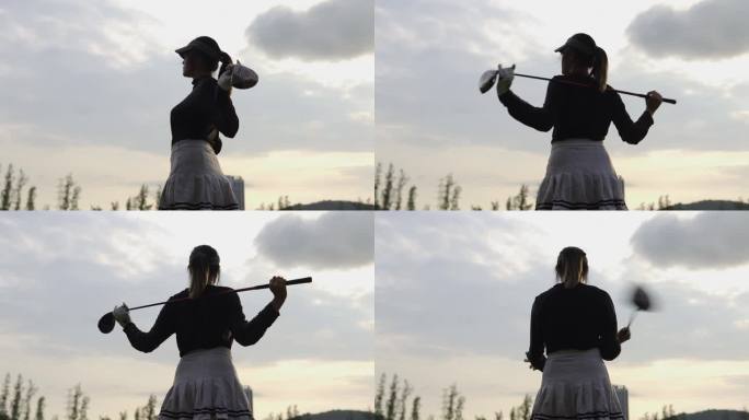 运动女士在高尔夫比赛前手持球杆进行训练。
