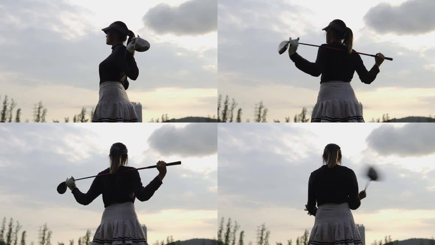 运动女士在高尔夫比赛前手持球杆进行训练。